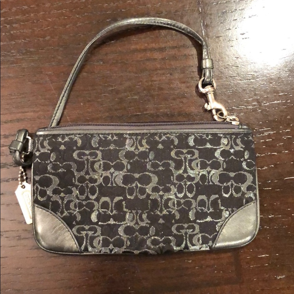 Black and silver coach wristlet